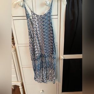 Juniors, blue and white floral romper. Like new. Only worn a handful of times.